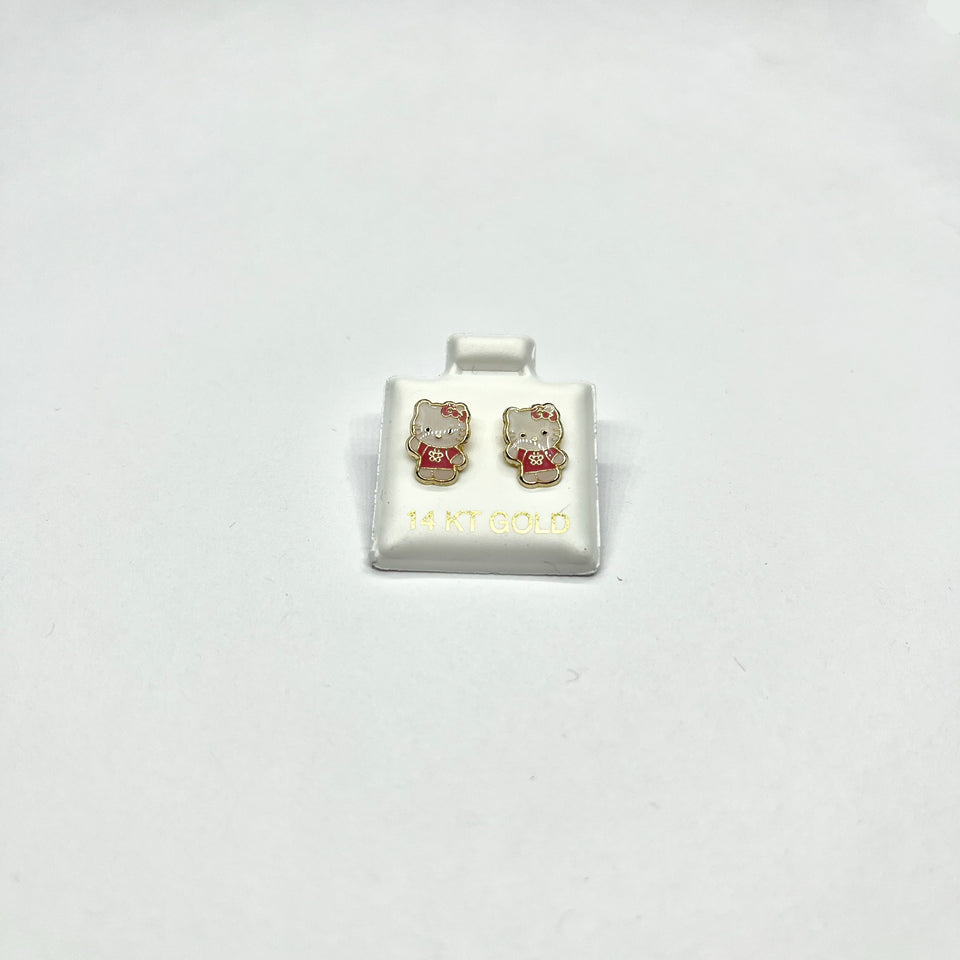 A pair of 14K gold Hello Kitty stud earrings on a white display stand.